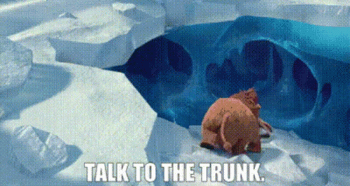 A Couple Of Animals Standing In The Snow With The Words Talk To The Trunk Below Them GIF