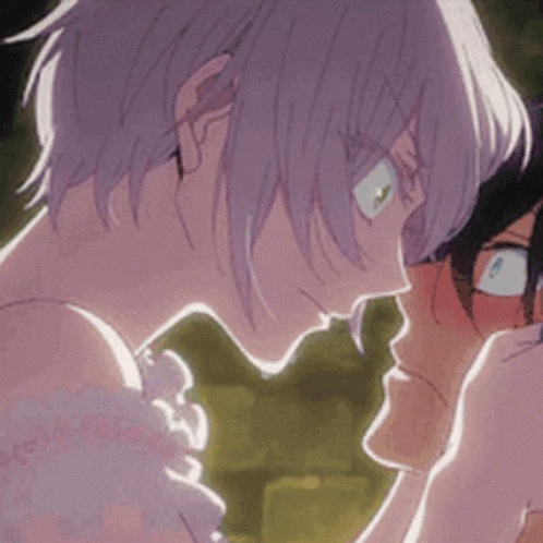 A Couple Of Anime Characters Are Looking At Each Other And Making A Heart Shape With Their Hands . GIF
