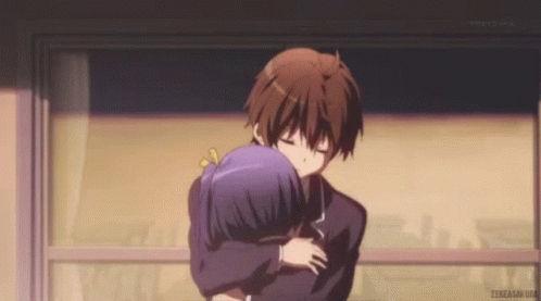 a couple of anime characters hugging each other with tokyo mx on the bottom right