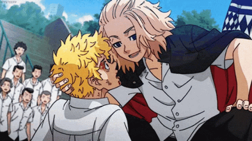A Couple Of Anime Characters Standing Next To Each Other In Front Of A Crowd Of People . GIF