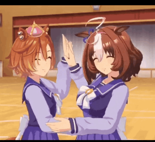 A Couple Of Anime Girls Are Giving Each Other A High Five GIF