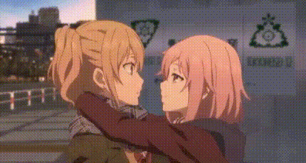 A Couple Of Anime Girls Are Hugging Each Other And Kissing . GIF