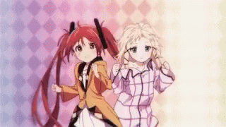 A Couple Of Anime Girls Are Standing Next To Each Other On A Pink And Blue Background . GIF