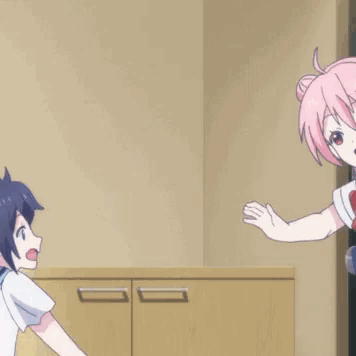 A Couple Of Anime Girls Hugging Each Other In A Room GIF