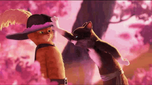 A Couple Of Cartoon Cats Standing Next To Each Other . GIF