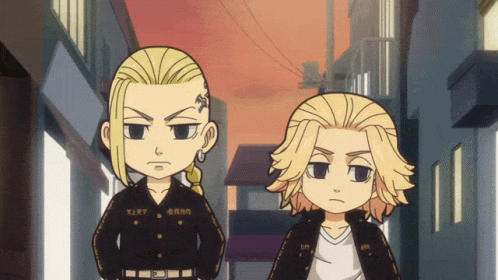A Couple Of Cartoon Characters Standing Next To Each Other With One Having A Tattoo On His Chest GIF