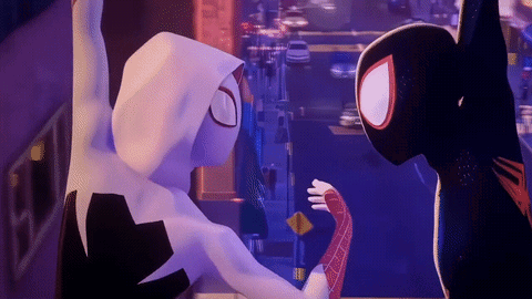 A Couple Of Cartoon Characters Standing Next To Each Other With One Of Them Wearing A Hood GIF