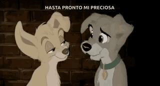 A Couple Of Cartoon Dogs Standing Next To Each Other . GIF