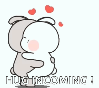 A Couple Of Cartoon Rabbits Hugging Each Other With The Words `` Hug Incoming '' . GIF