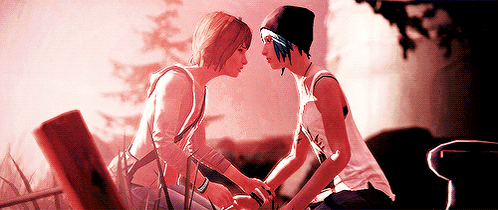 a couple of girls looking at each other with a red background