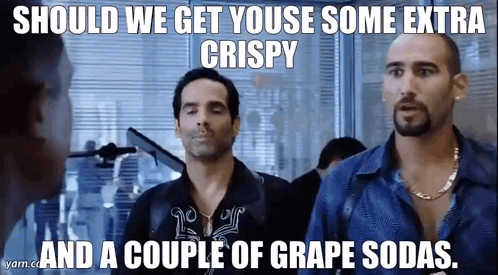 A Couple Of Men Are Standing Next To Each Other With A Caption That Says Should We Get You Use Some Extra Crispy GIF