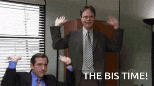 A Couple Of Men In Suits And Ties Are Standing Next To Each Other With Their Arms In The Air . GIF