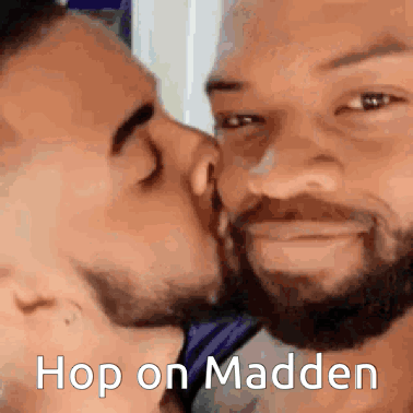 A Couple Of Men Kissing With The Words Hop On Madden Written On The Bottom GIF
