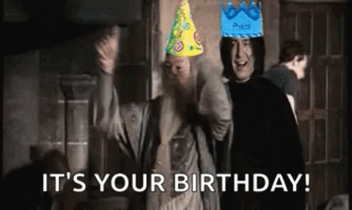 A Couple Of Men Wearing Party Hats Are Standing Next To Each Other And Saying `` It 'S Your Birthday ! '' GIF