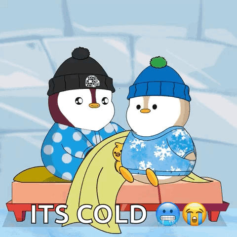 A Couple Of Penguins Sitting On A Bench With The Words It 'S Cold Above Them GIF