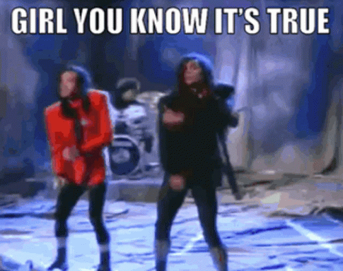 A Couple Of People Dancing On A Stage With The Words Girl You Know It 'S True Above Them GIF