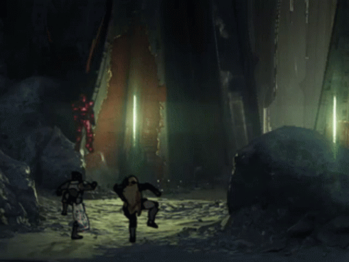 A Couple Of People Standing In A Dark Room With A Red Light Behind Them GIF