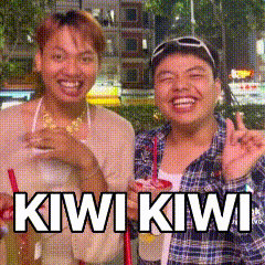 A Couple Of People Standing Next To Each Other With The Words Kiwi Kiwi Written On The Bottom GIF