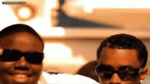 People Wearing Sunglasses Smiling Seventhhex.com GIF