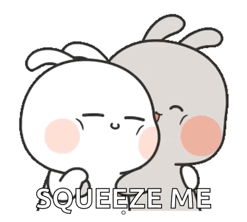 A Couple Of Rabbits Hugging Each Other With The Words `` Squeeze Me '' On The Bottom . GIF