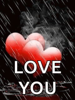 A Couple Of Red Hearts With Smoke Coming Out Of Them And The Words `` I Love You '' GIF
