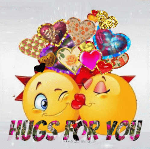 A Couple Of Smiley Faces Kissing With The Words Hugs For You GIF