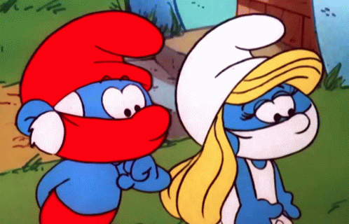 A Couple Of Smurfs Are Standing Next To Each Other And One Has A Red Hat On GIF
