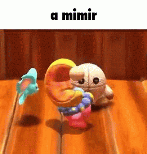A Couple Of Stuffed Animals Are Dancing On A Wooden Table With A Caption That Says A Mimir . GIF