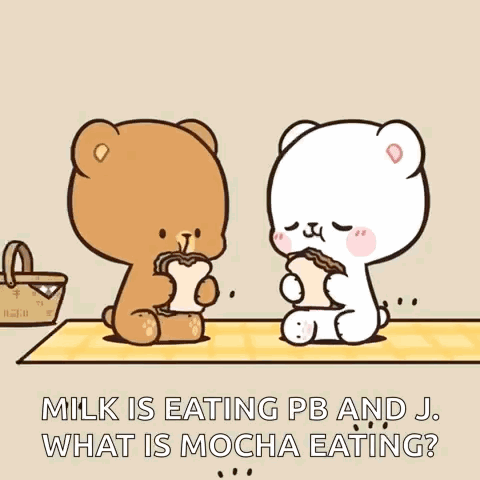 A Couple Of Teddy Bears Are Sitting At A Table Eating Bread . GIF
