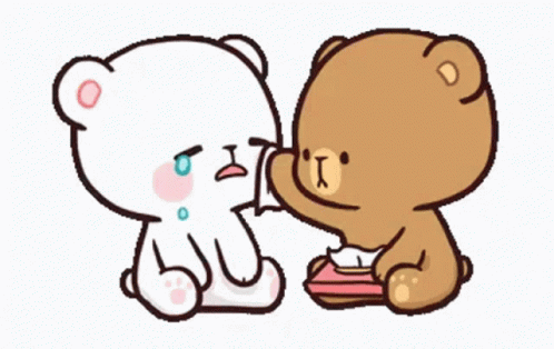 A Couple Of Teddy Bears Are Sitting Next To Each Other . GIF