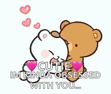 A Couple Of Teddy Bears Standing Next To Each Other With Hearts On Them . GIF