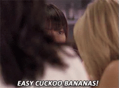 A Couple Of Women Standing Next To Each Other And One Of Them Is Saying `` Easy Cuckoo Bananas ! '' GIF
