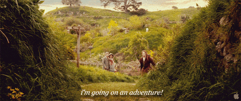 A Couple Walking Through A Hedge With The Words I 'M Going On An Adventure Below Them GIF