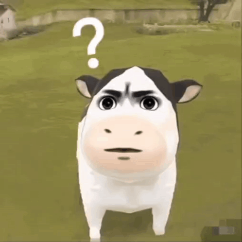 a cow with a question mark on its head is standing in a grassy field .