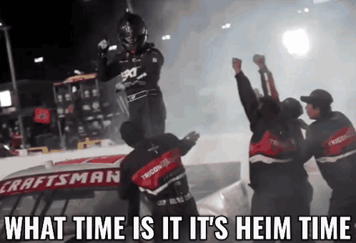 A Craftsman Race Car Is Being Lifted By A Man GIF