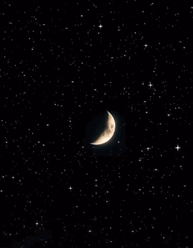 A Crescent Moon In A Starry Night Sky GIF