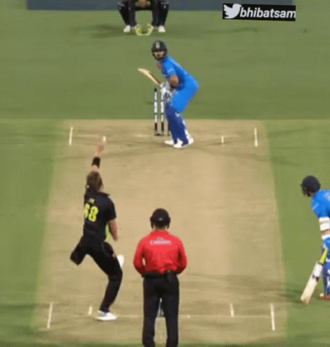 A Cricket Game Is Being Played With A Twitter Logo In The Background GIF