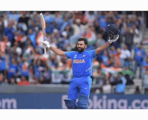 A Cricket Player Wearing A Blue India Jersey Holds His Bat In The Air GIF