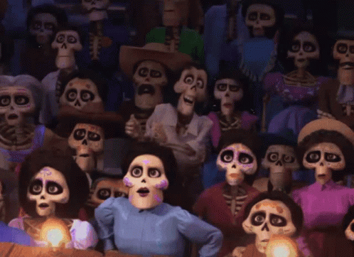 A Crowd Of Cartoon Skeletons Are Sitting In A Theater GIF