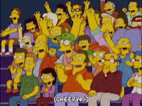 A Crowd Of People Are Cheering In A Stadium And The Word Cheering Is On The Bottom GIF