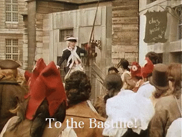 A Crowd Of People Are Gathered In Front Of A Building With The Words To The Basline Written On It GIF
