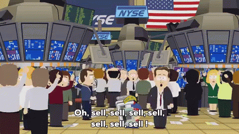 A Crowd Of People Are Gathered In Front Of A Nyse Sign GIF