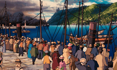 a crowd of people are gathered in front of boats in the water