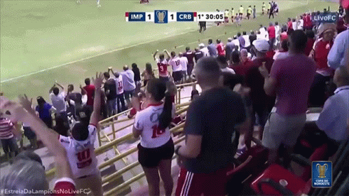A Crowd Of People Are Watching A Soccer Game And The Score Is 1 To Crb GIF