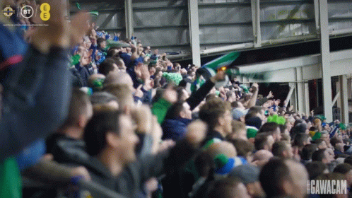 A Crowd Of People Cheering In A Stadium With #Gavacam Written On The Bottom GIF