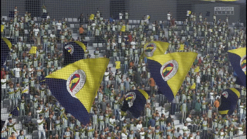 A Crowd Of People In A Stadium With A Ea Sports Logo In The Background GIF