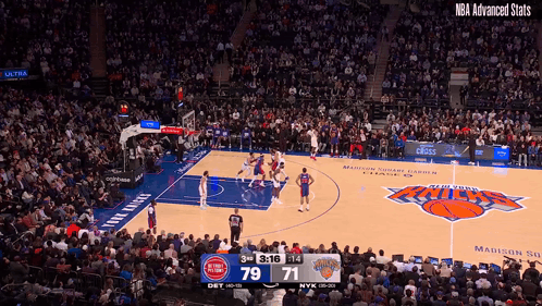 A Crowd Watching A Basketball Game With The Score 79 71 GIF