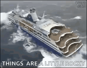 A Cruise Ship Is Floating On Top Of The Ocean . GIF