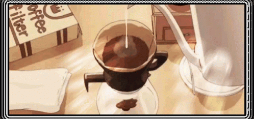 A Cup Of Coffee Is Being Poured Into A Glass Cup On A Table . GIF
