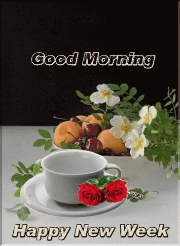 A Cup Of Coffee Sits On A Saucer Next To A Bowl Of Cherries GIF